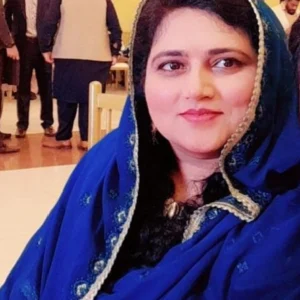 Female Math and Physics teacher explaining concepts in a digital or classroom setting.