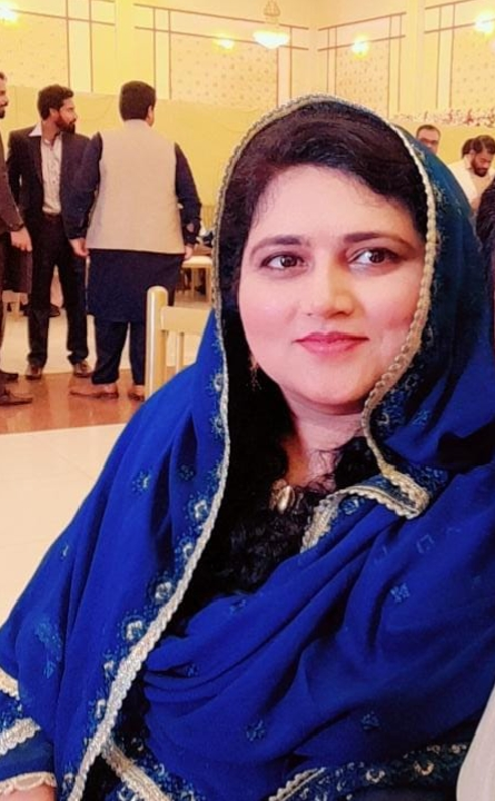 Female Math and Physics teacher explaining concepts in a digital or classroom setting.